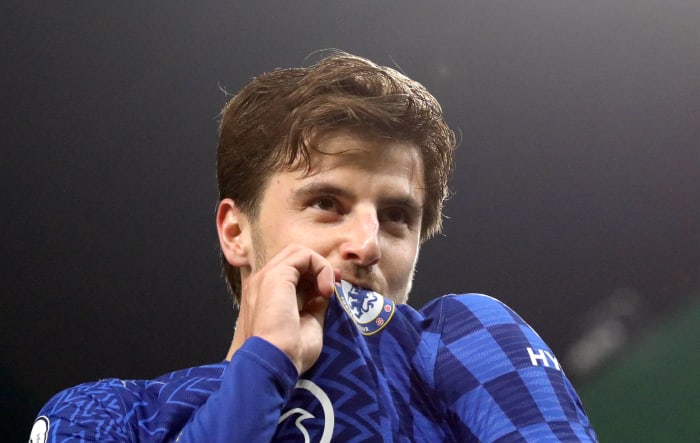Mason Mount kisses the Chelsea badge after scoring a goal in their 3-1 win at Norwich